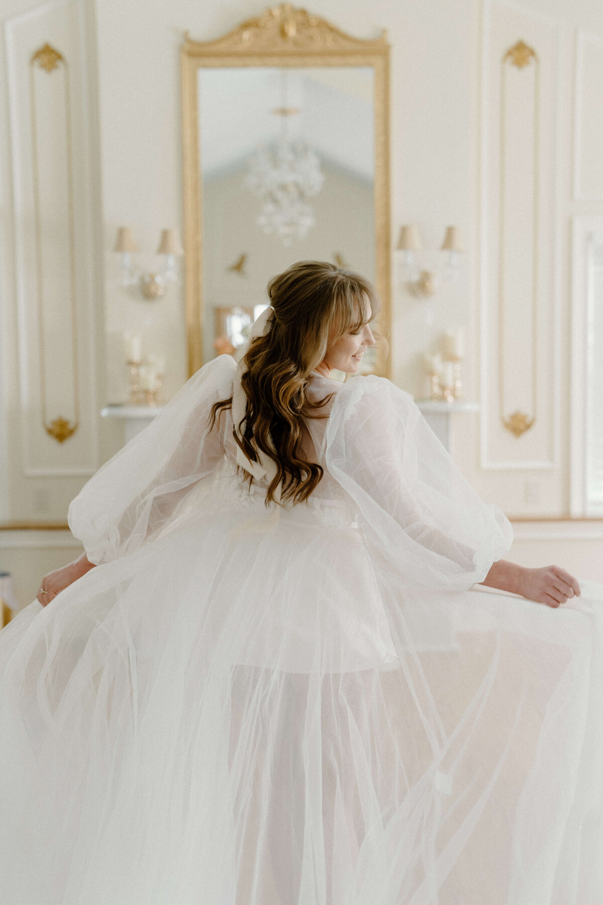 bride in white flowing dress