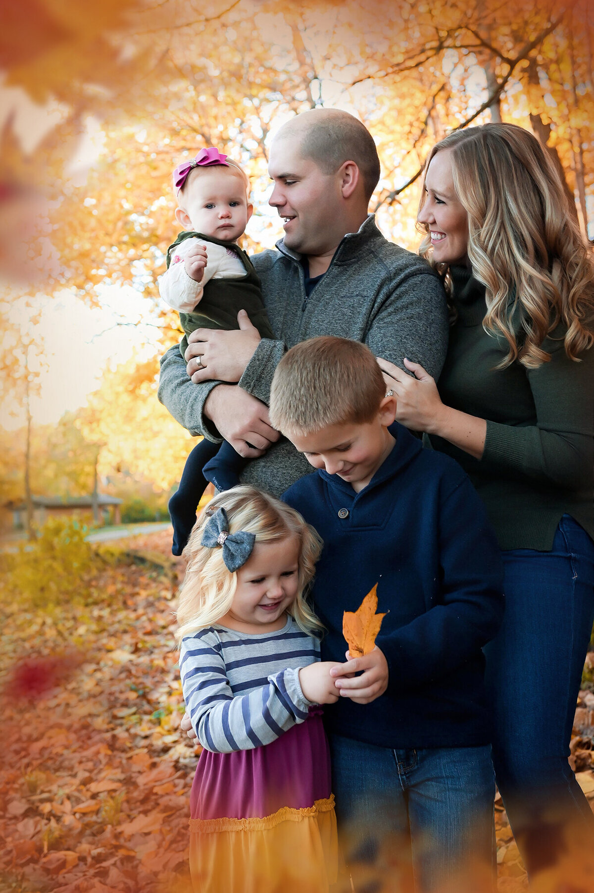 Pella Family Photographer catches candid moments of a family of 5