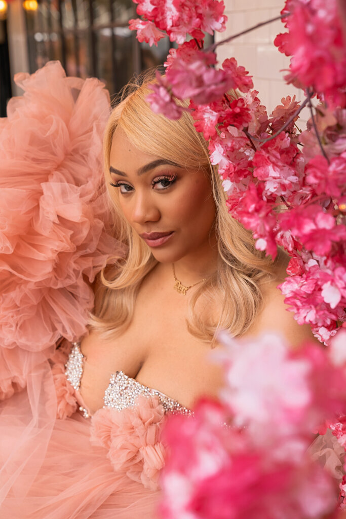Intimate Paris portrait session at flower filled cafe featuring close up of woman