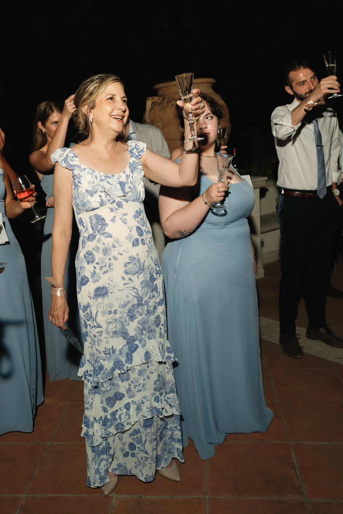 Joyful dance floor moments at this Tuscany destination wedding