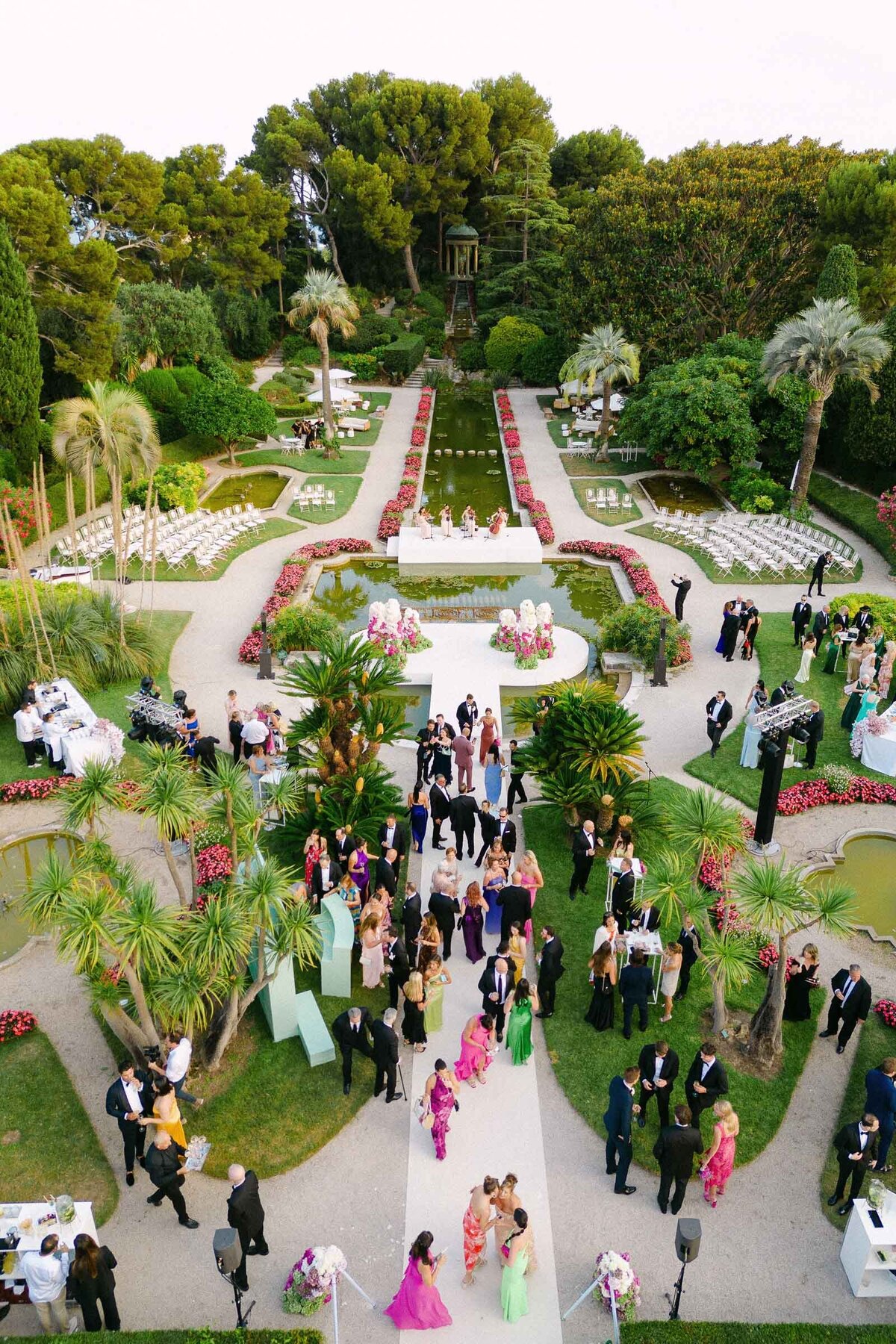 Drone image of the cocktail hour in the iconic gardens of VIlla Ephrussi.