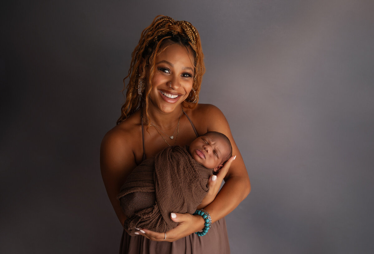 black newborn and mom photo