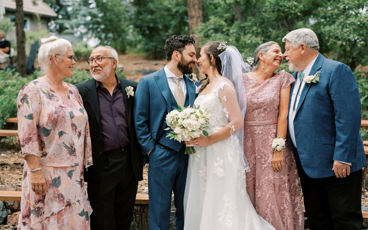 family poses for a group photo