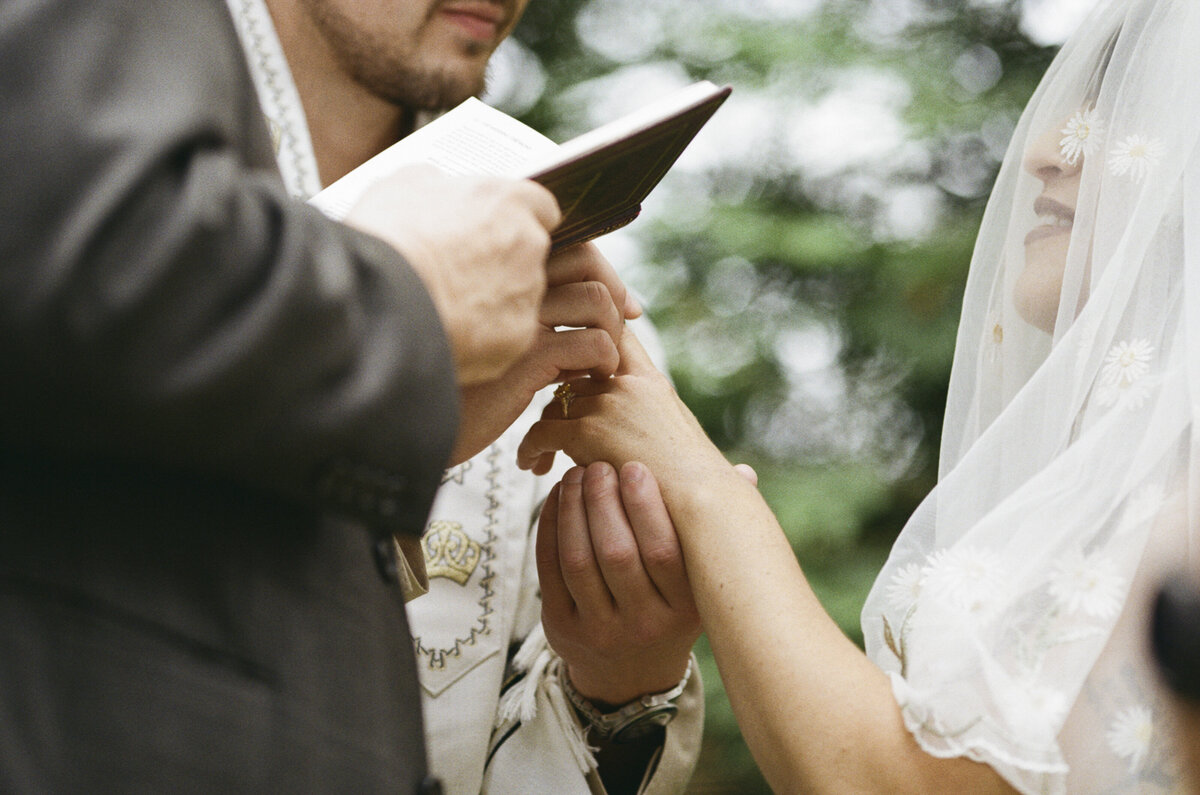 Hudson Valley wedding photos of candid moments with friends and chosen family at backyard elopement