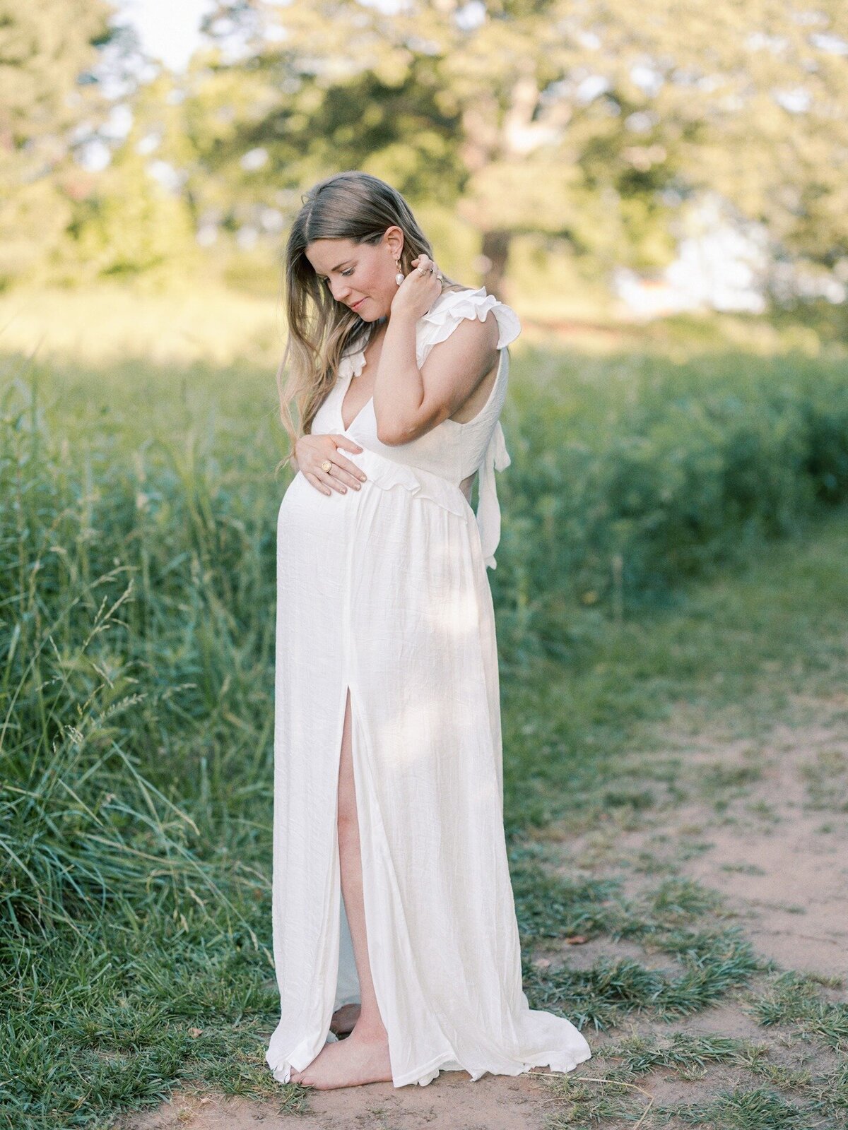 expecting-mother-looking-down-at-belly