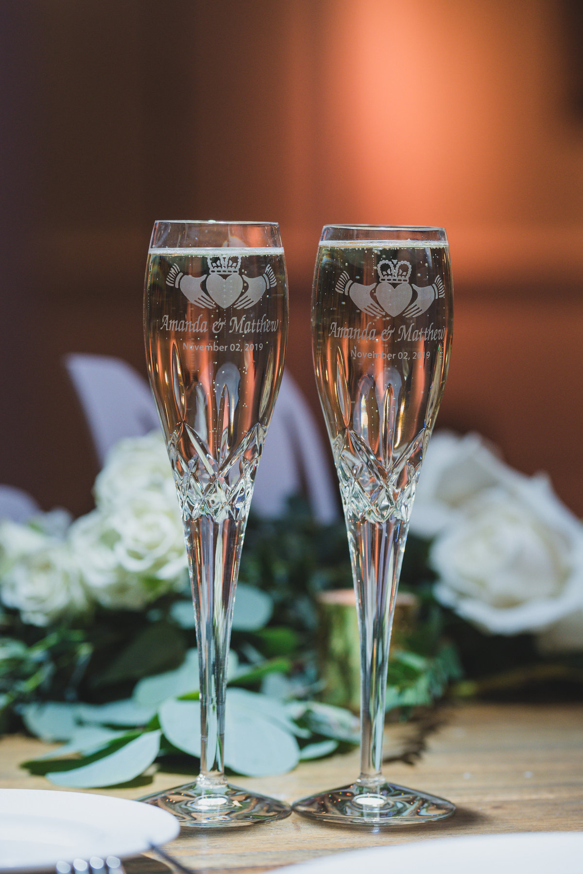 wedding photo of engraved champagne glasses at The Vineyards at Aquebogue