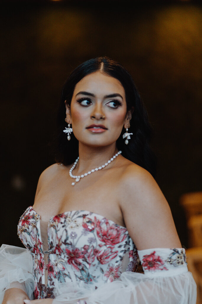 Bride wearing unique gold and pearl jewellry by Joanna Bisley Designs, photo by Paola Hesse. Featured on the Brontë Bride Vendor Guide.