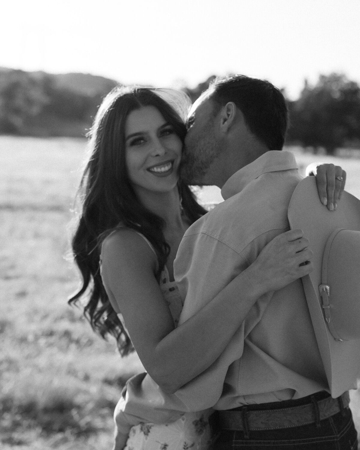 candid couples engagement photos black and white in San Luis Obispo