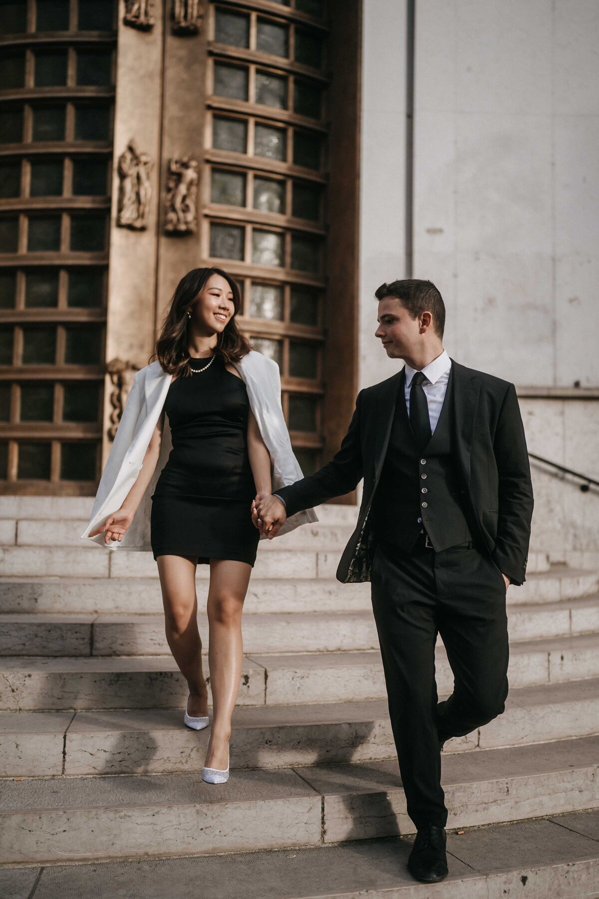 Elegant engagement portraits in Palais Royal garden in Paris