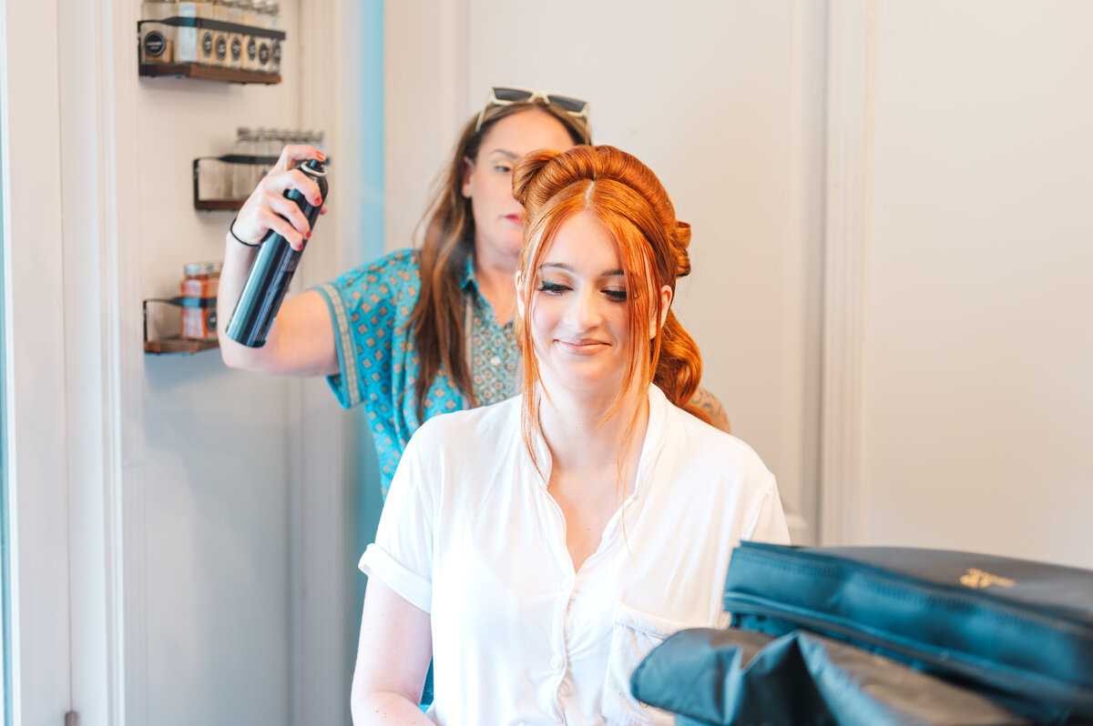 lexington bride on the morning of her wedding getting hair done