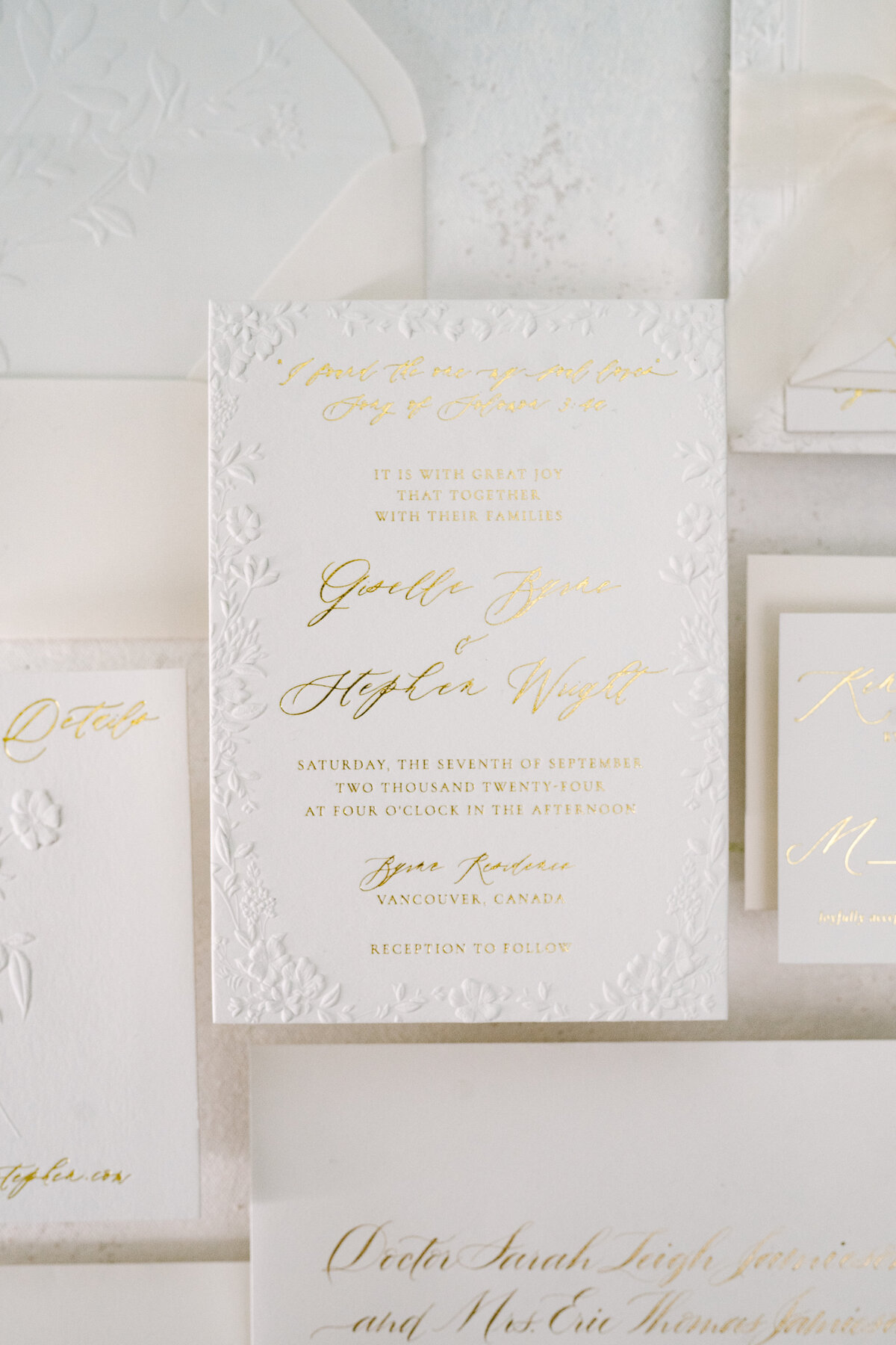 Sculpted embossing white and gold wedding invitation