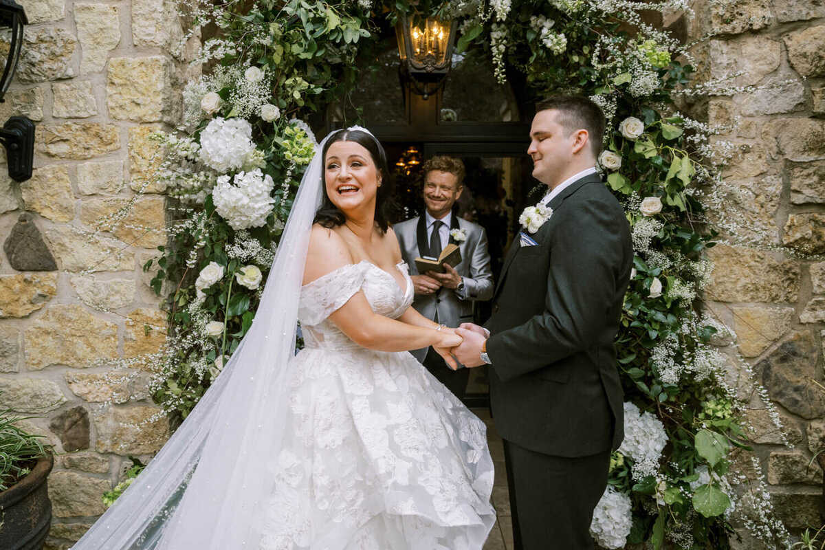 couple-laughing-during-vows