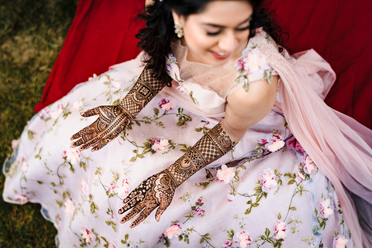 Capture the beauty of mehndi in your NJ Indian wedding with Ishan Fotografi.