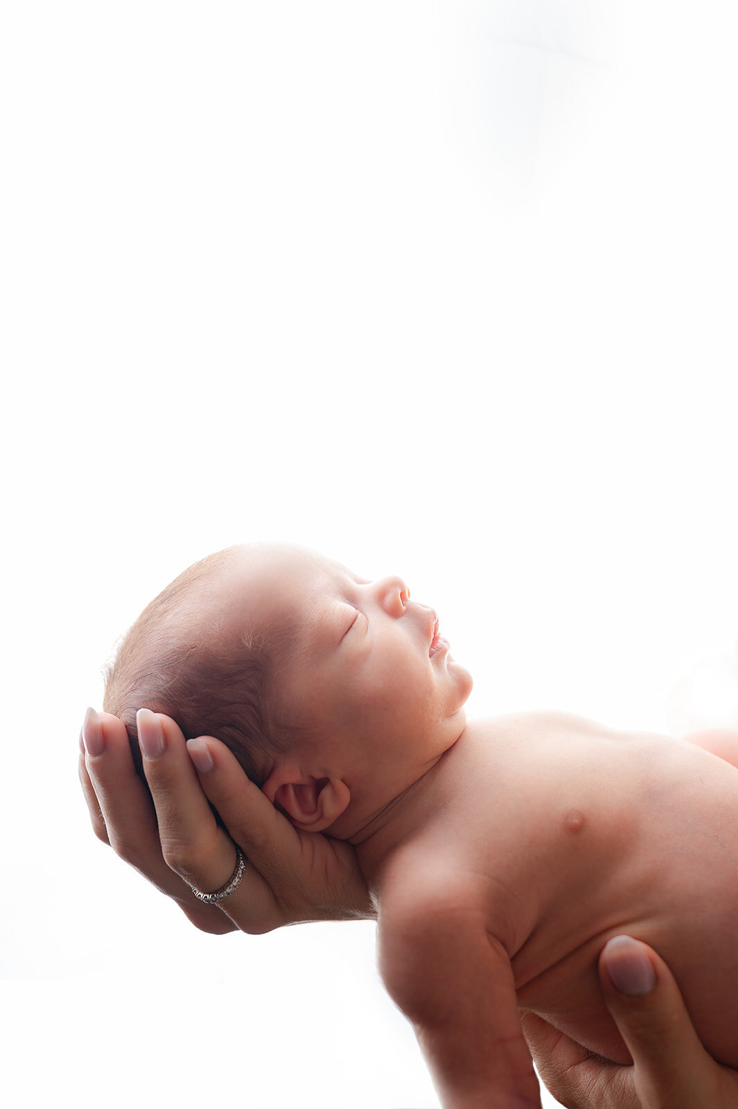 connecticut-newborn-photography-head-in-hands