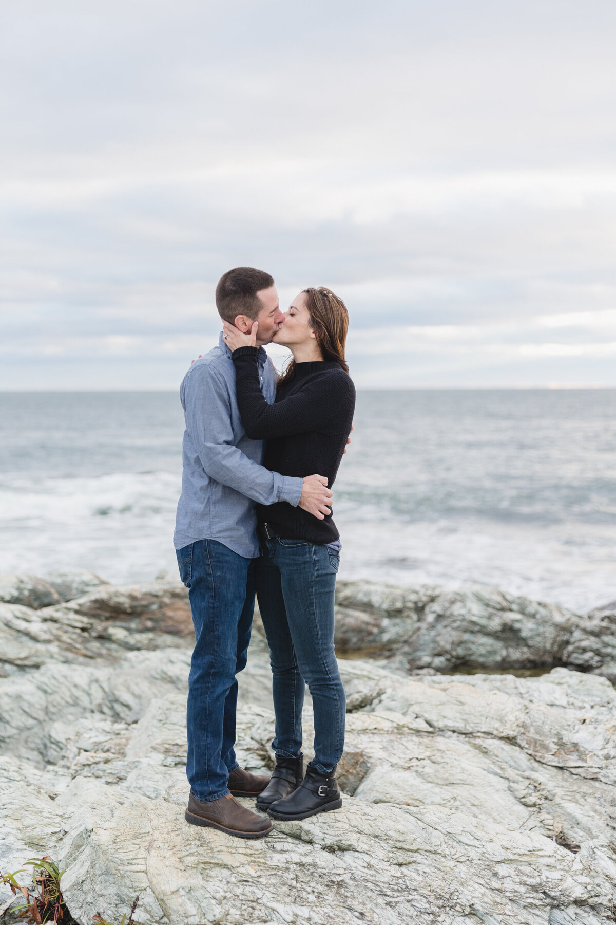 Romantic moment between a n engaged couple at Brenton Point Park