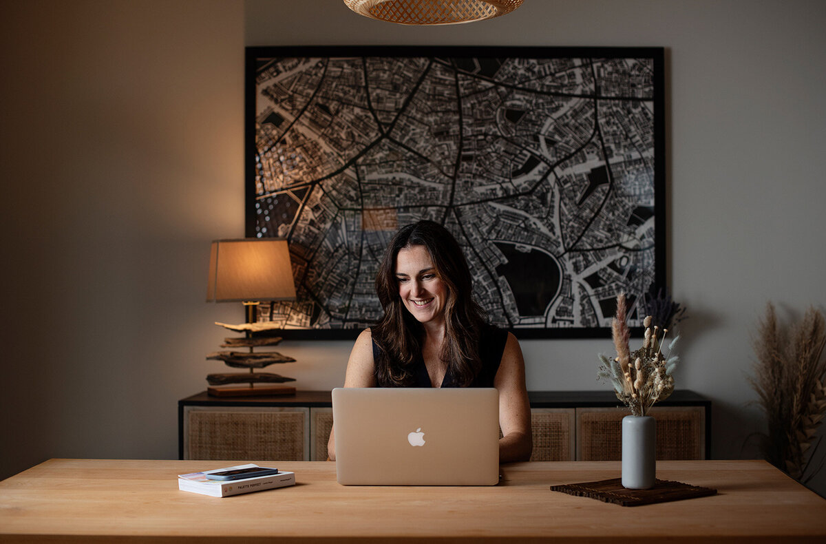 Minimalist workspace with neutral tones and design tools for Baer Brand Studio