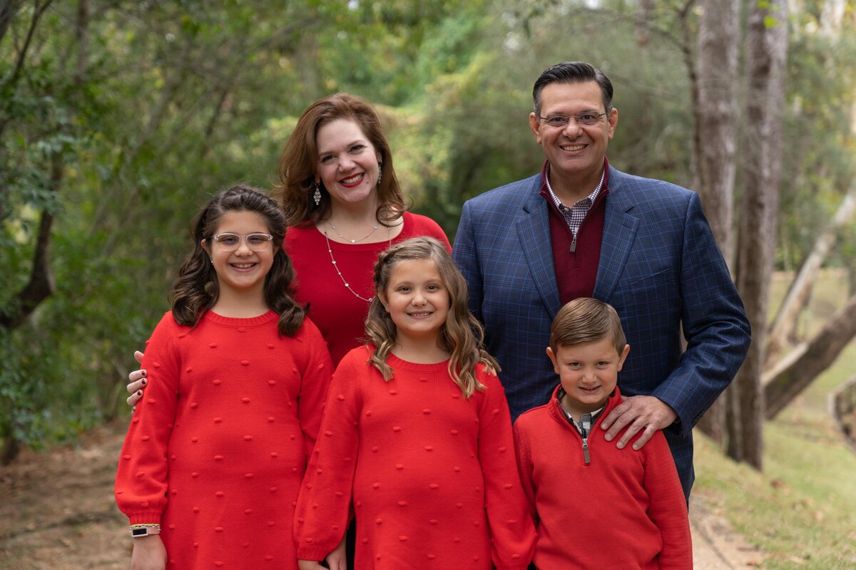 Beautiful greek family posing for holiday photos for Houston freelance photographer