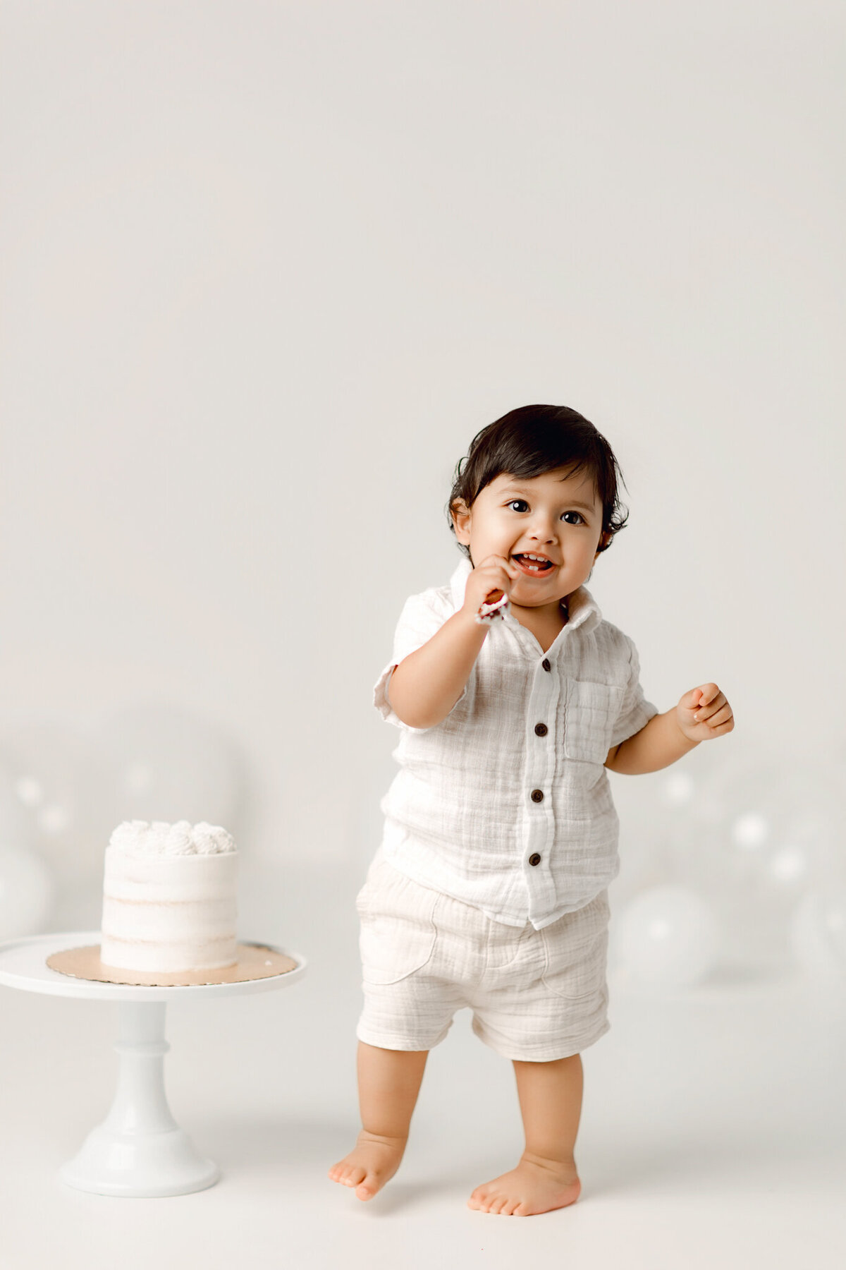 NW Arkansas cake smash photographer, cake smash photography near me, baby birthday photoshoot NW Arkansas