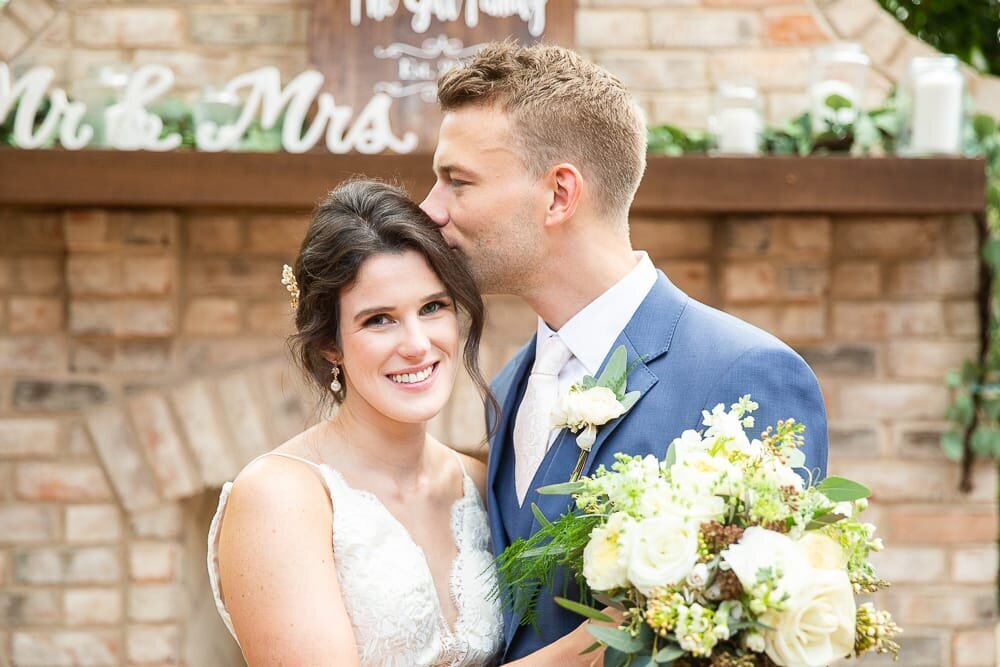 bride-groom-white-wedding-florals