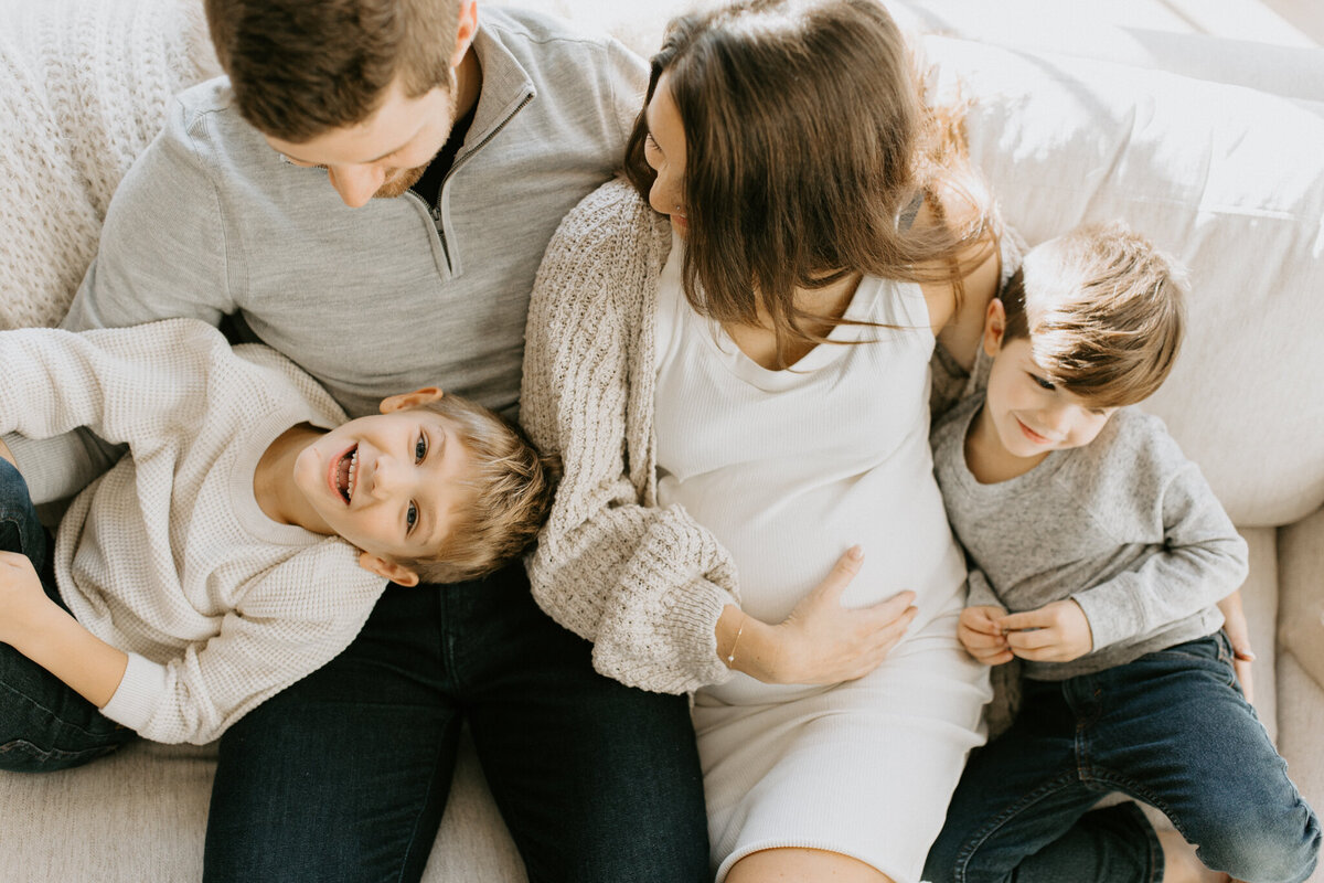 pregnant-mom-holds-toddler-1