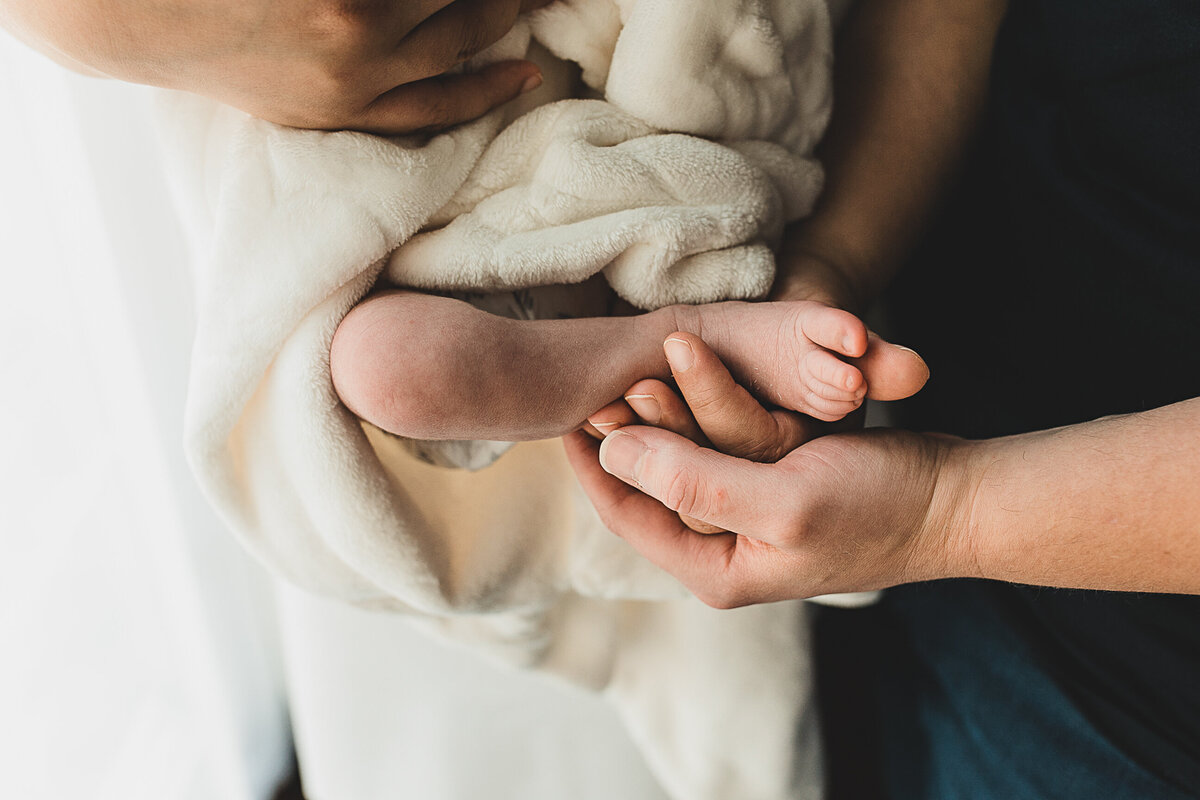 Newborn baby hand and foot.