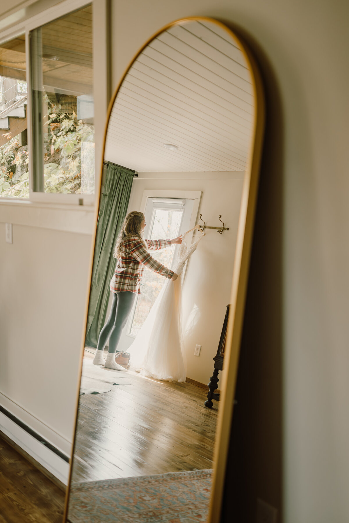 bride looking at her dress