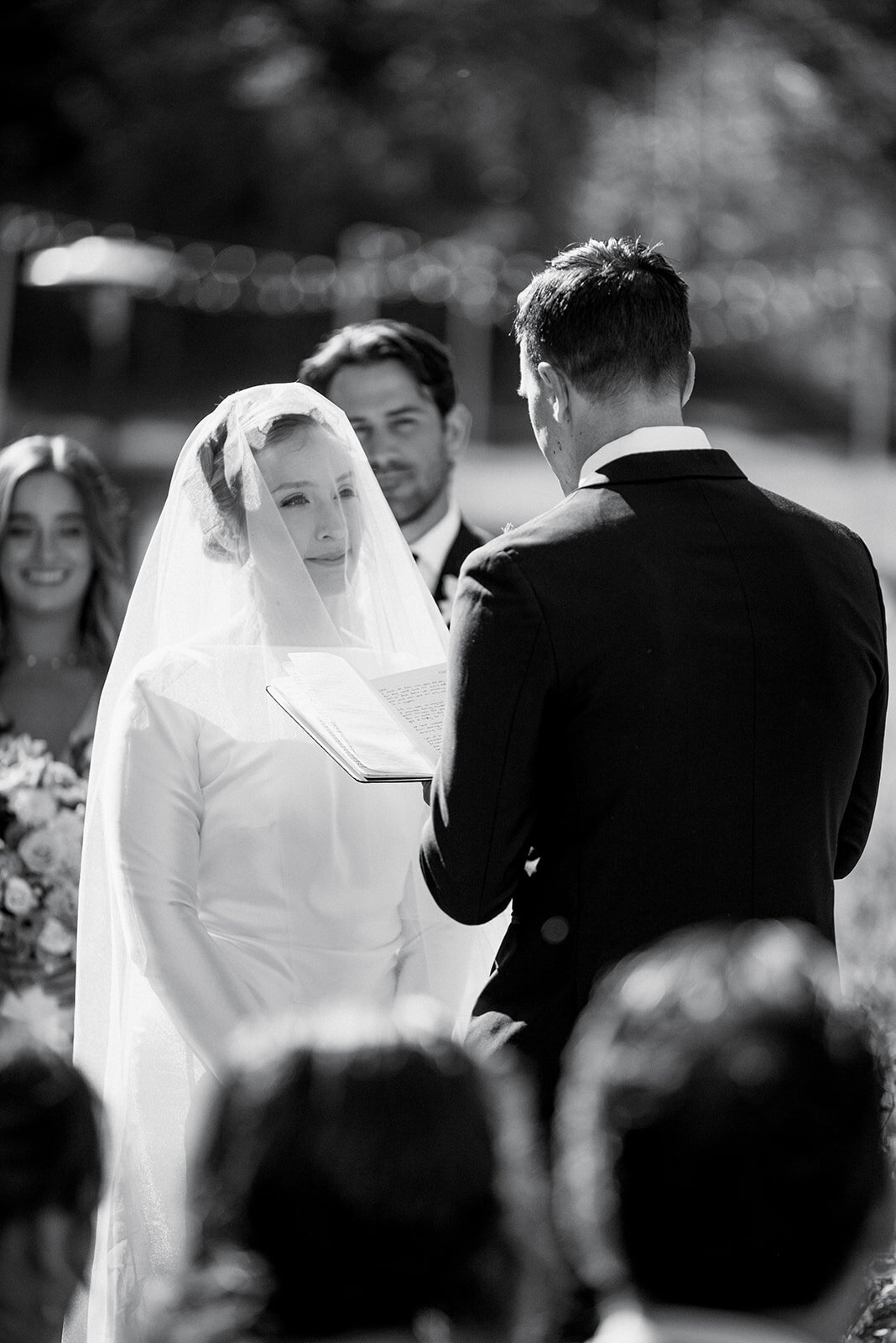 A bride and groom say their vows at a Boise Wedding coordinated by Perfect Thirds & Co.