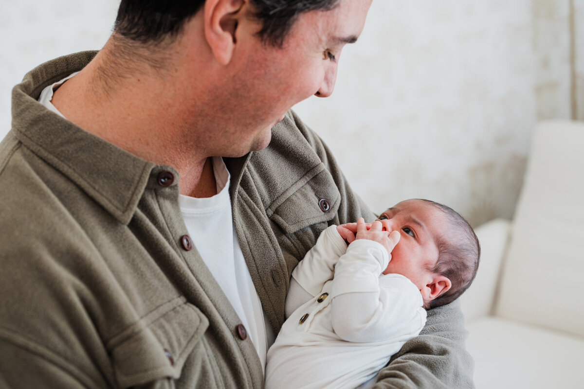 dad-looking-at-baby