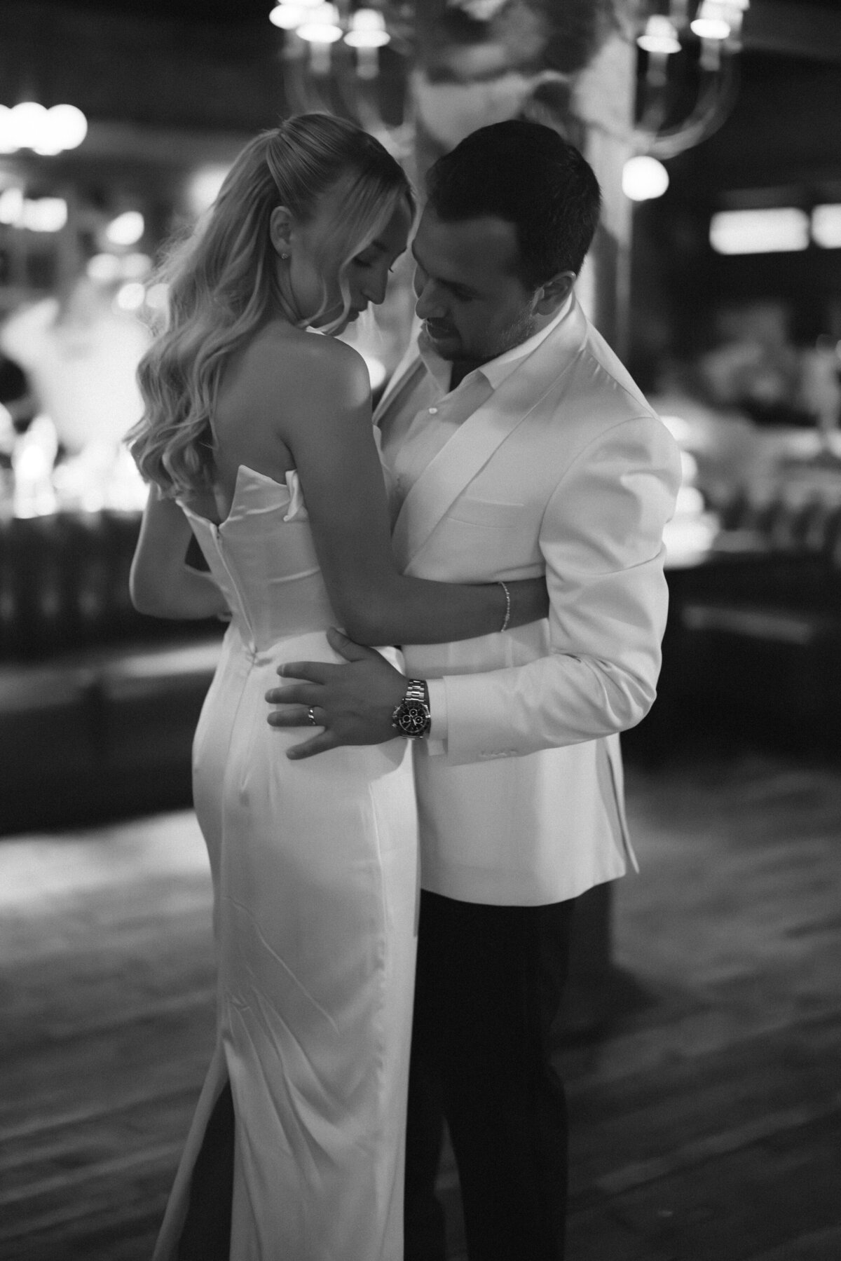 Sophisticated editorial wedding photography captures reception moments at Trivoli Tavern Chicago, featuring Lauren Alatriste's fashion forward approach combining magazine-worthy imagery with celebration energy and authentic wedding emotion.