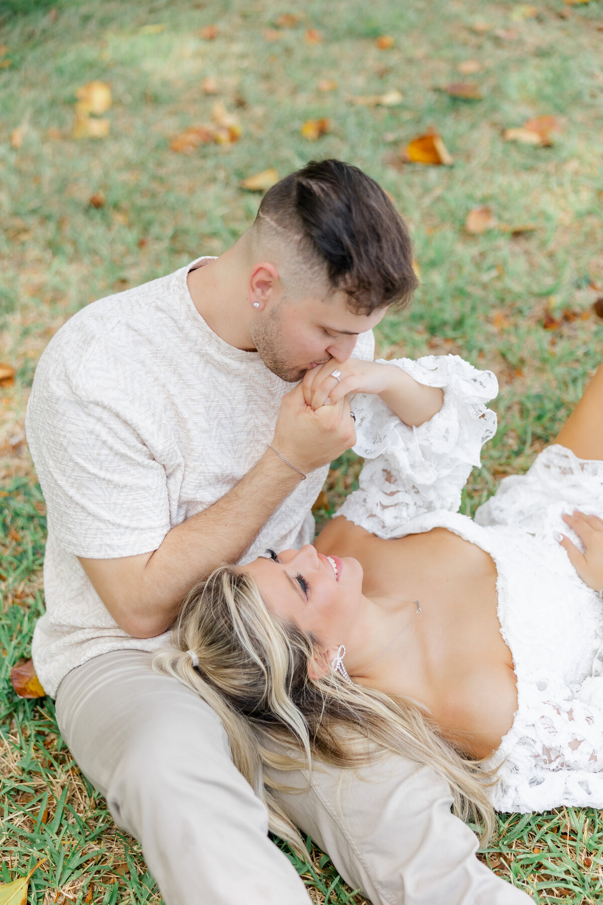 man kissing woman's hand taken by wedding photographers in orlando