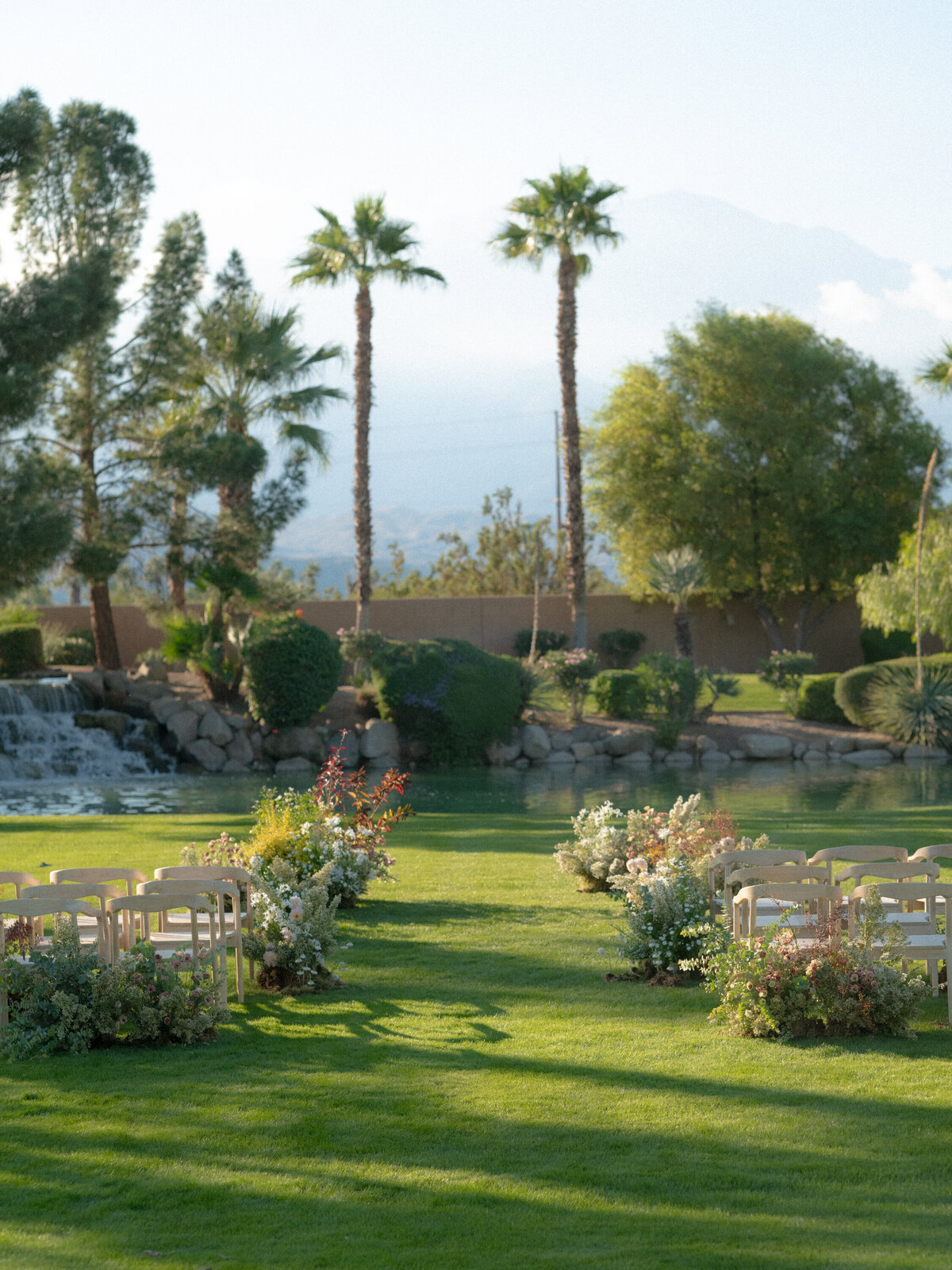 Ceremony site with chairs and florals set up