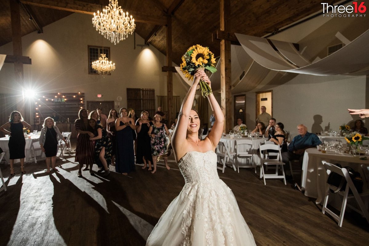 Bouquet toss by the new Bride