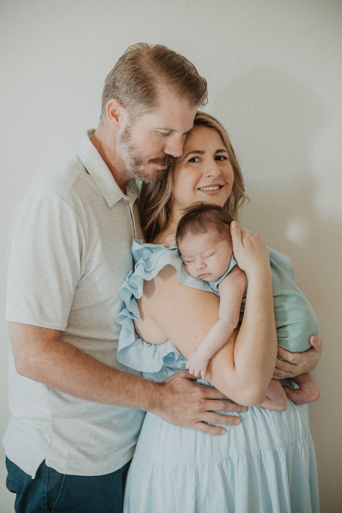 dad-looks-at-newborn-baby