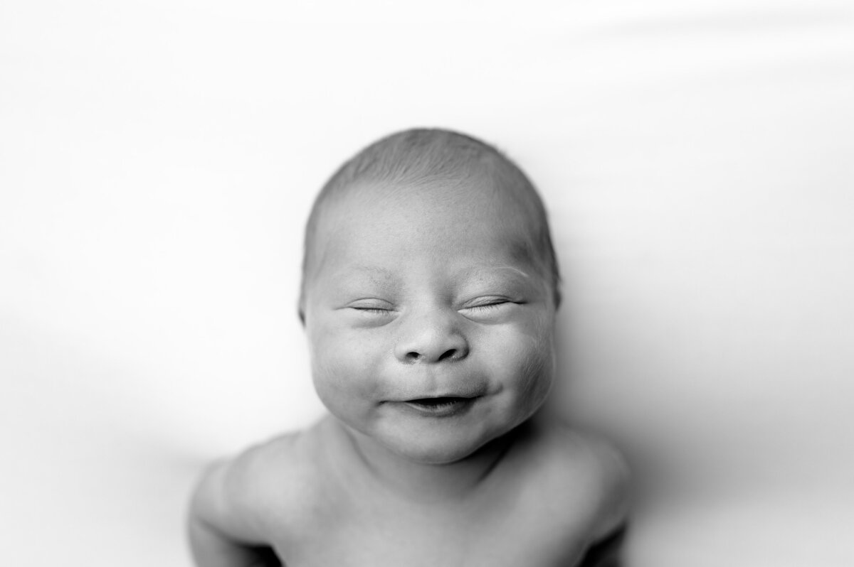 smiling newborn baby photos