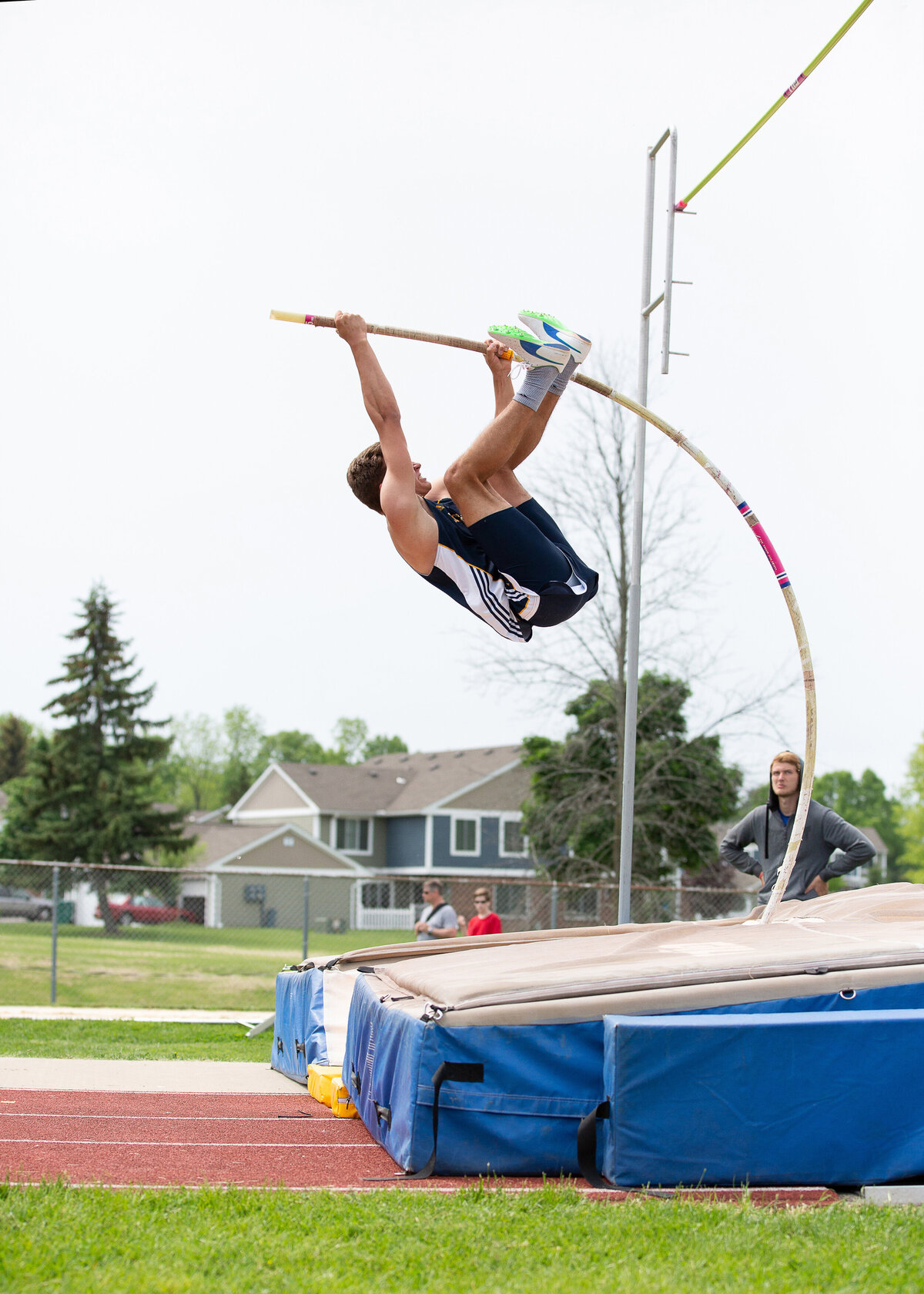 Pole vaulting track and field photo