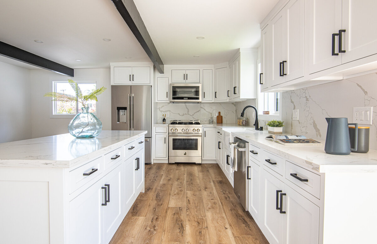 modern-white-kitchen-marble-island-wood-floors