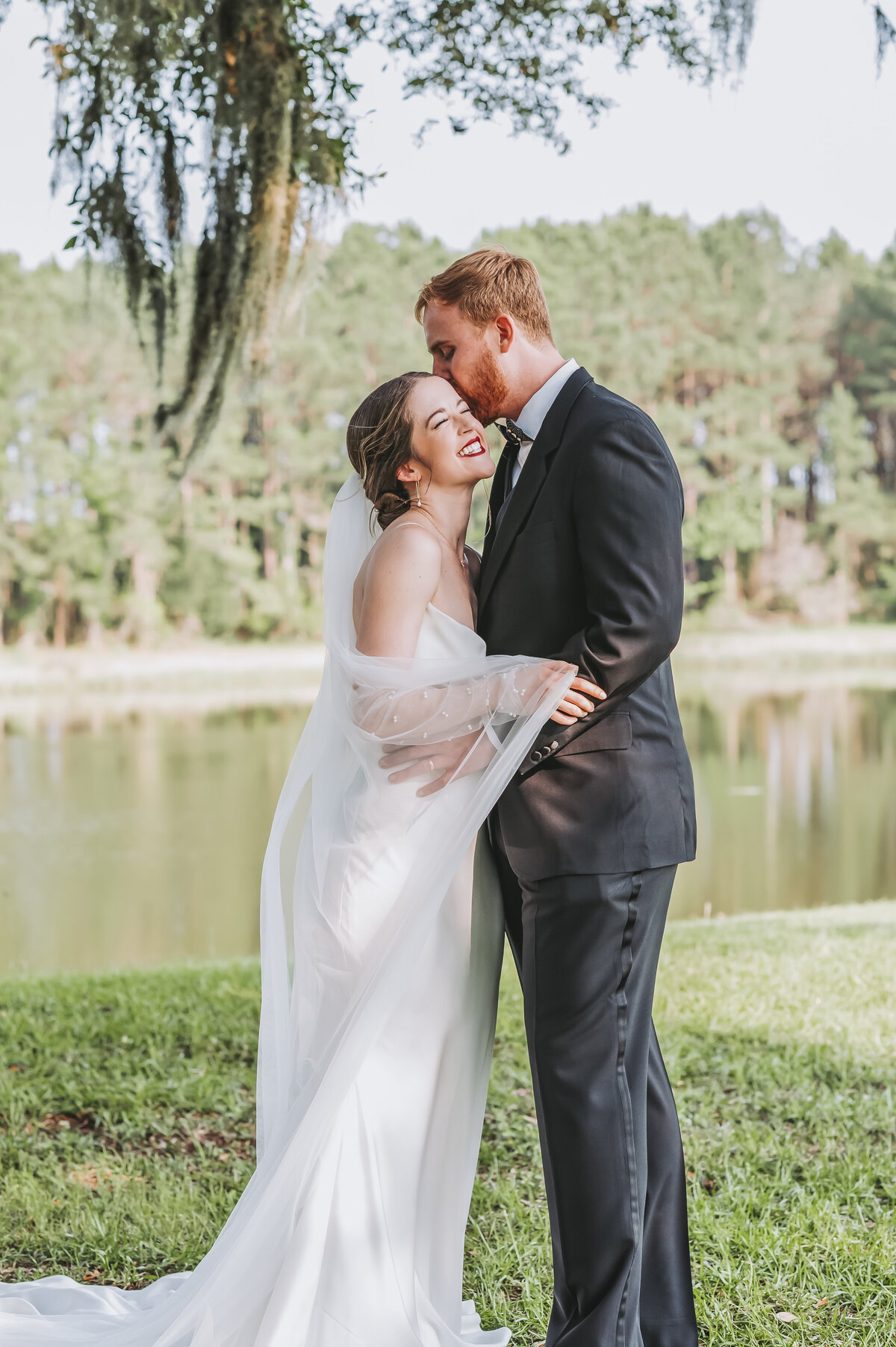 Temple kiss under spanish moss