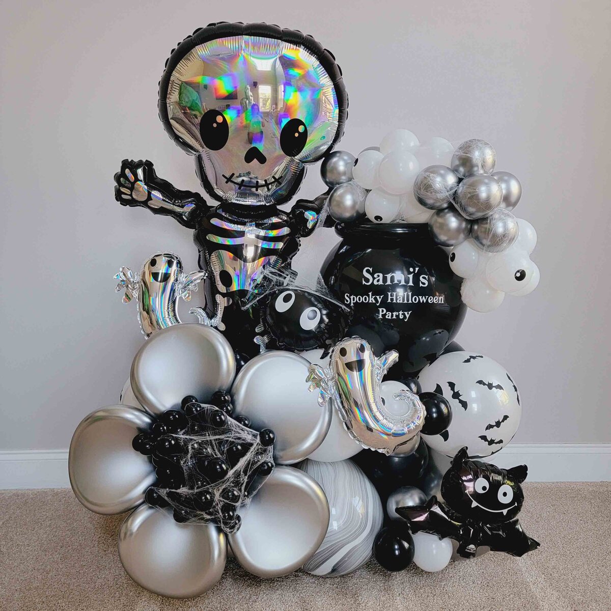 Halloween celebration with Air with Flair Decor's Premium Balloon Bouquet, featuring a spooky and delightful Halloween theme.