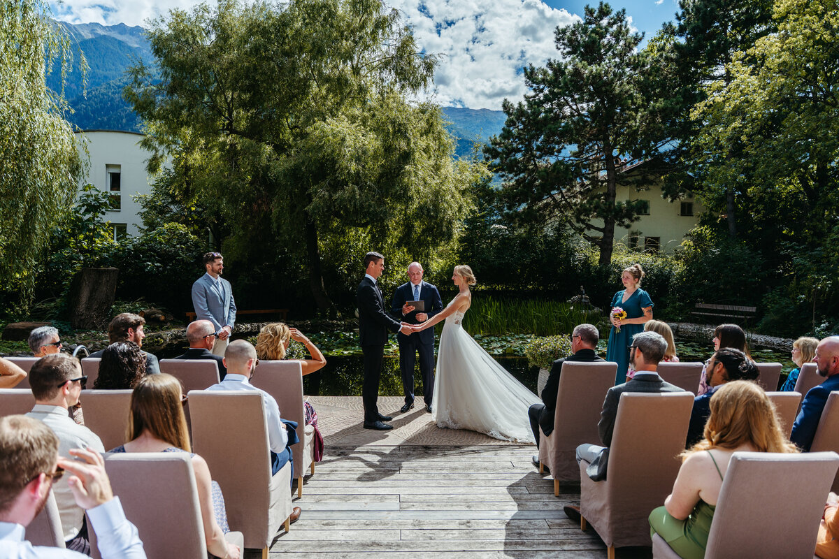vegan wedding ceremony on natural pond dock