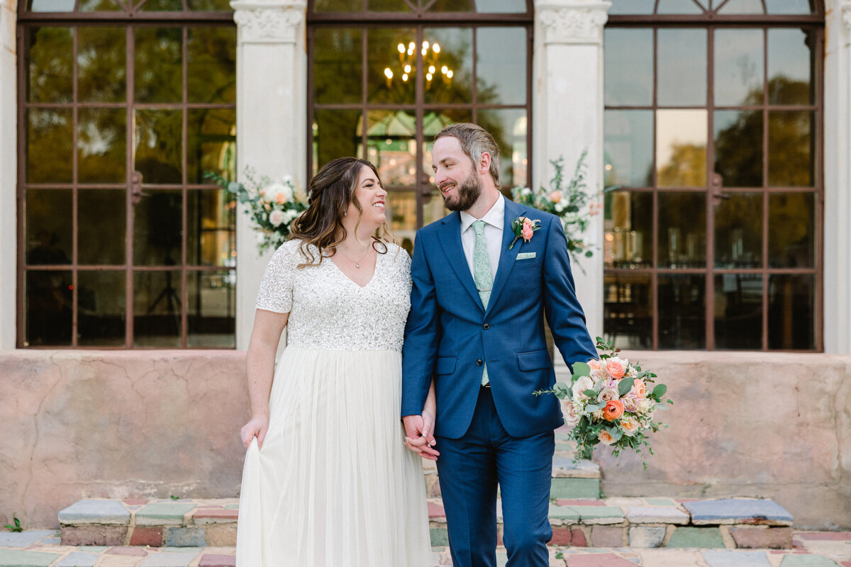 couple walking and laughing