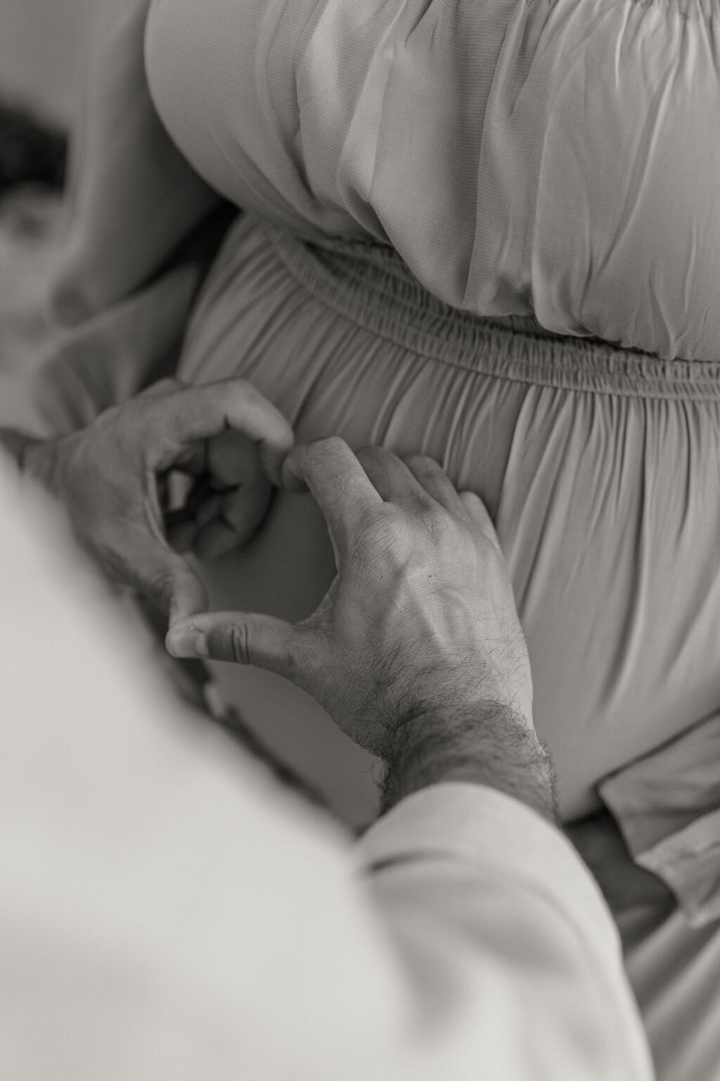 maternity-miami-beach-heart-hands-belly-bw