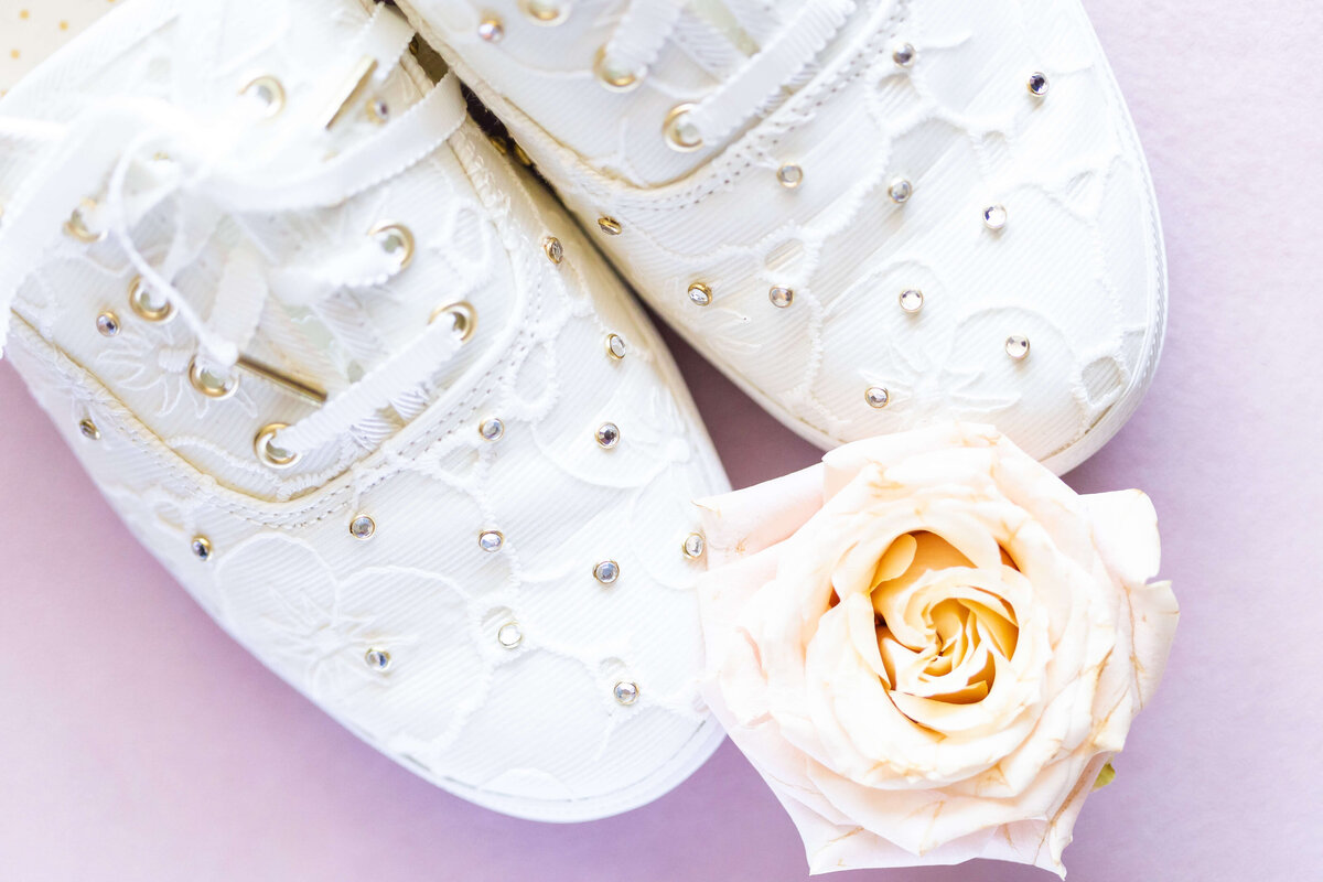 Wedding sneakers with diamontes encrusted with a single white rose