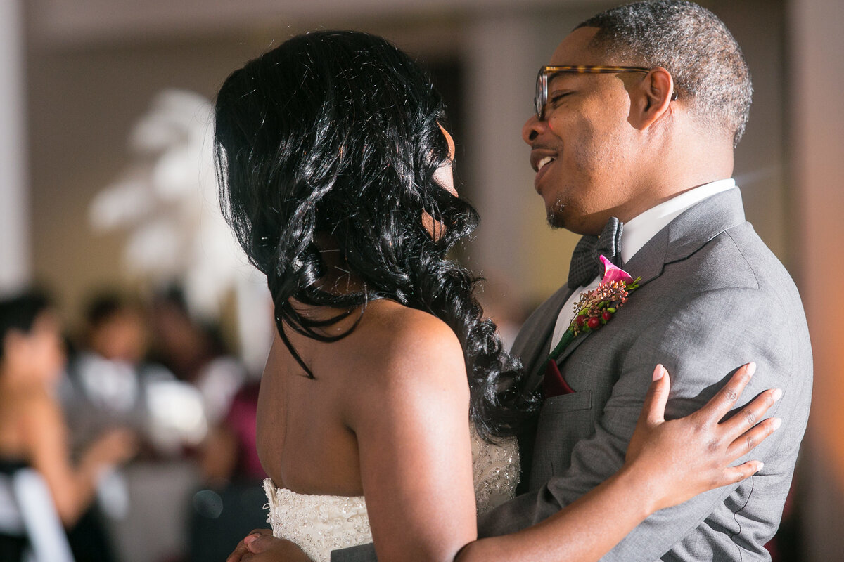 Newlyweds share their first dance in the ballroom at the Foundry Art Centre in Missouri.