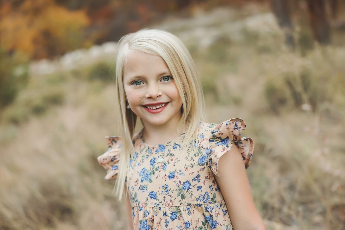 Little girl posed for family pictures