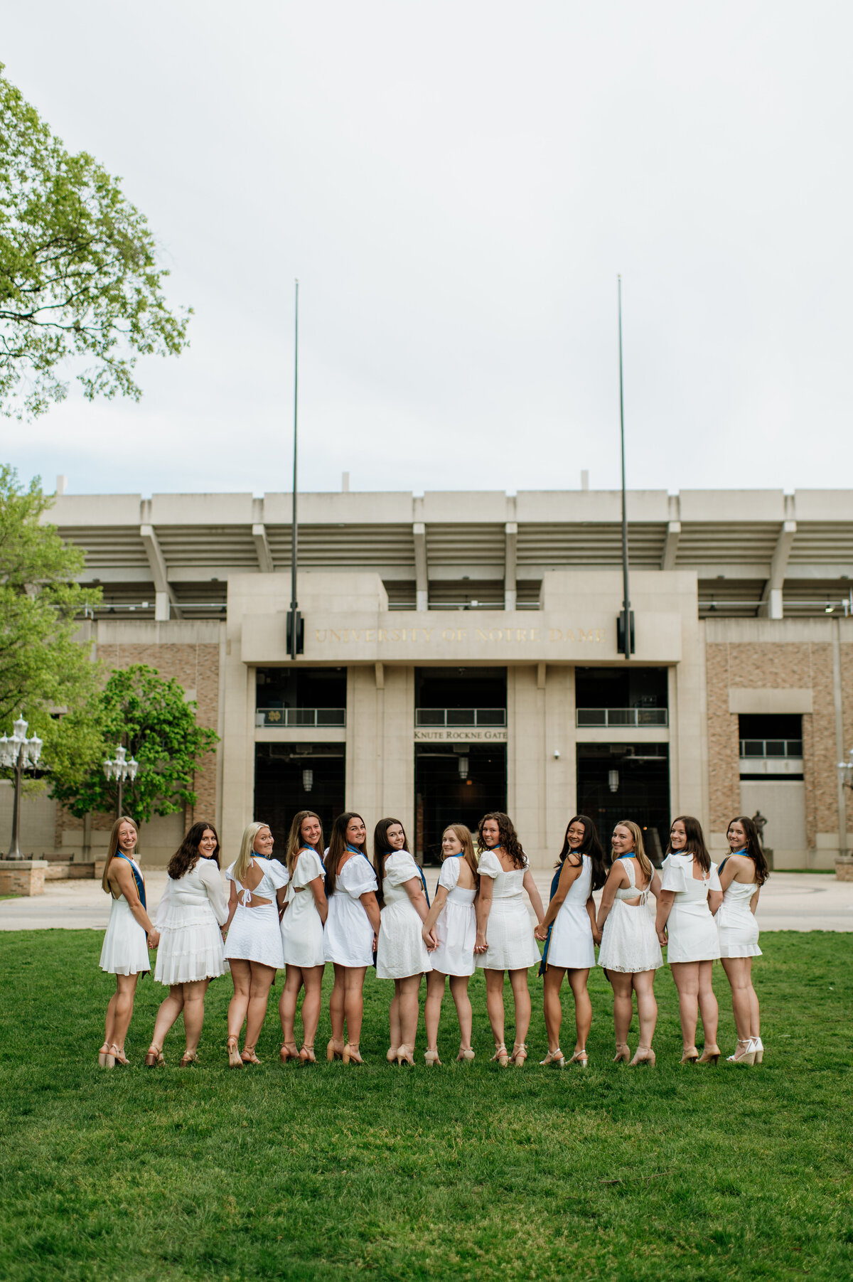 Graduation photo with friends in caps and gowns