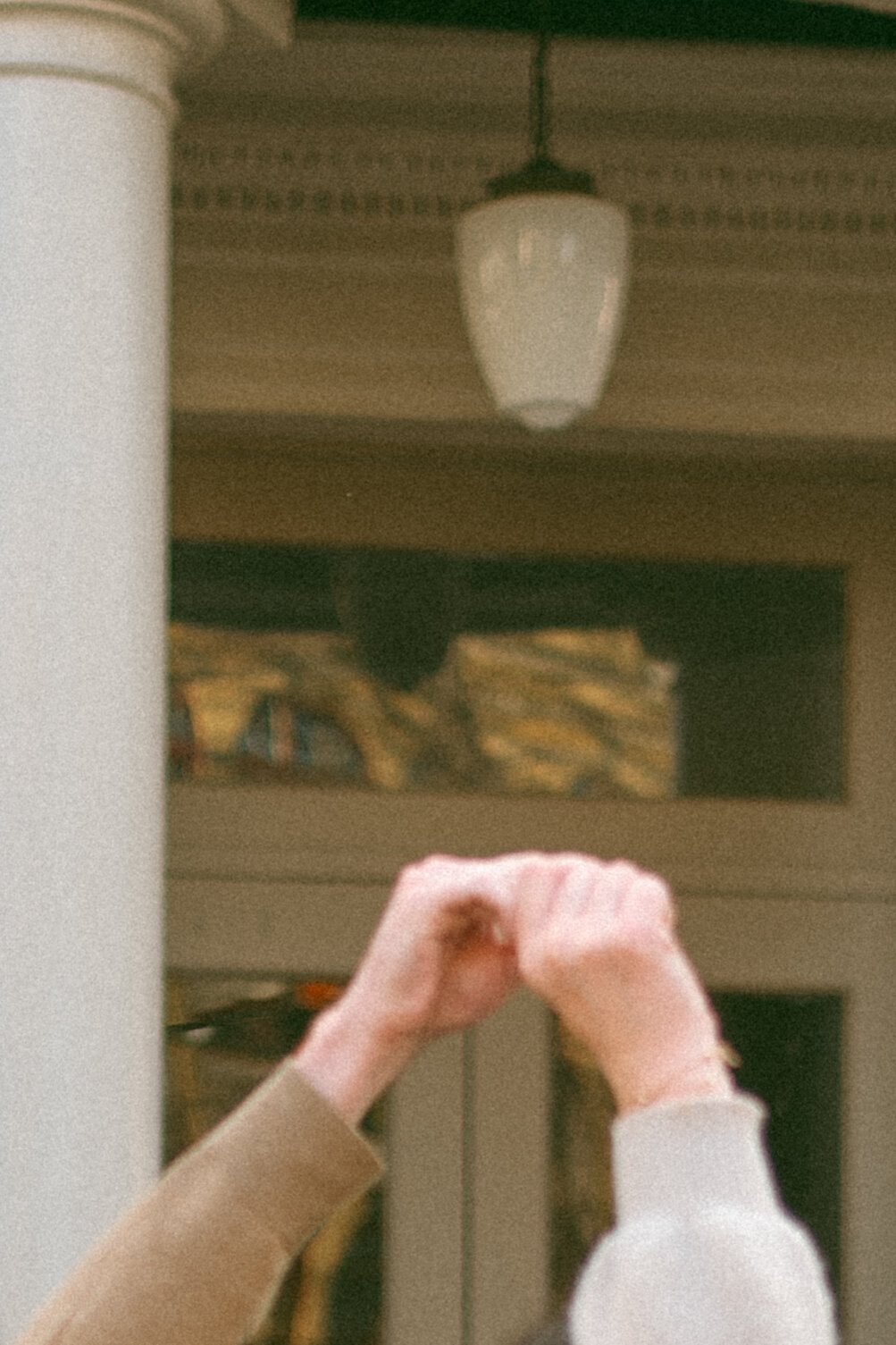 hands intertwined together