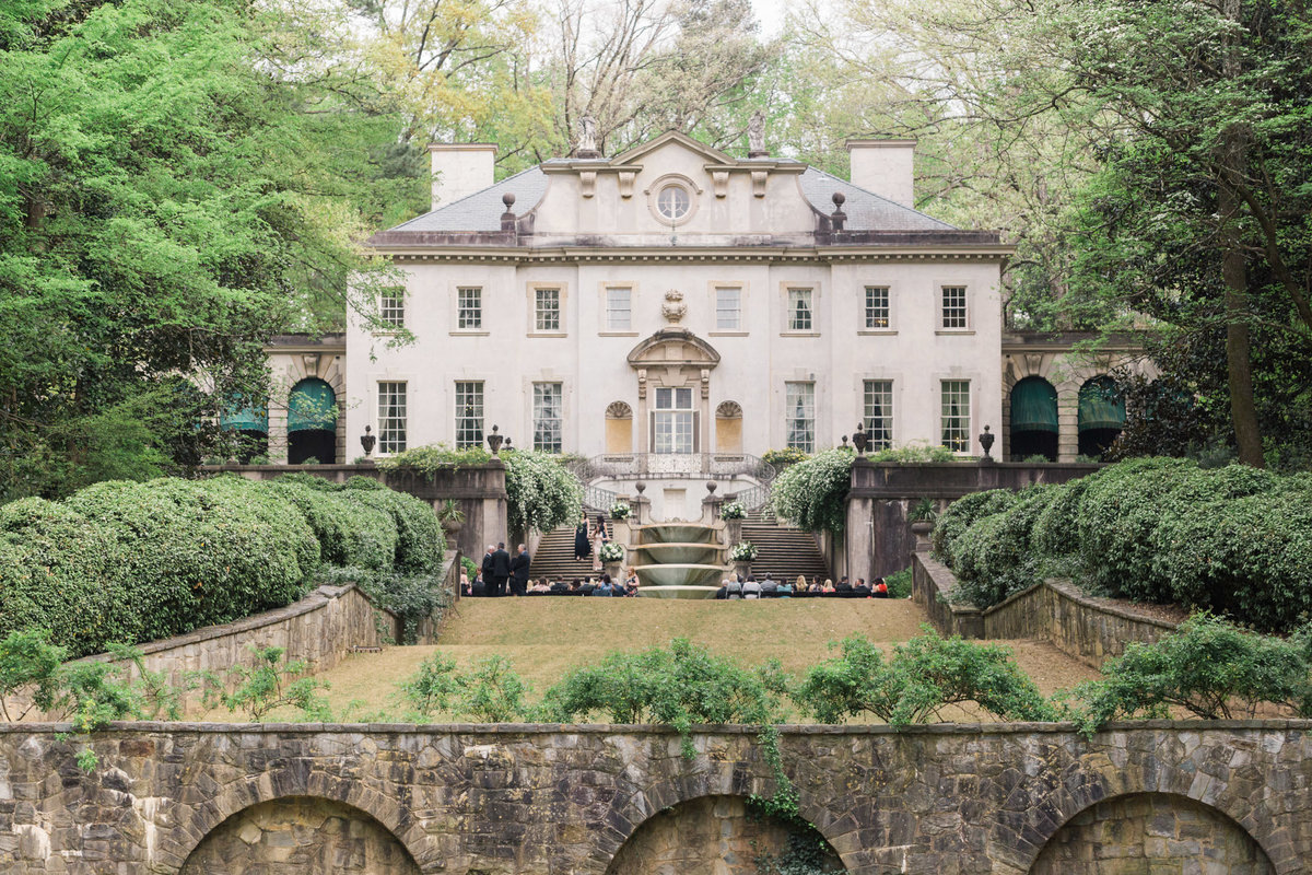 The setting for President Snow's house in the hunger games, this backdrop is an exceptional wedding ceremony choice. Photo by luxury destination wedding photographer Rebecca Cerasani.