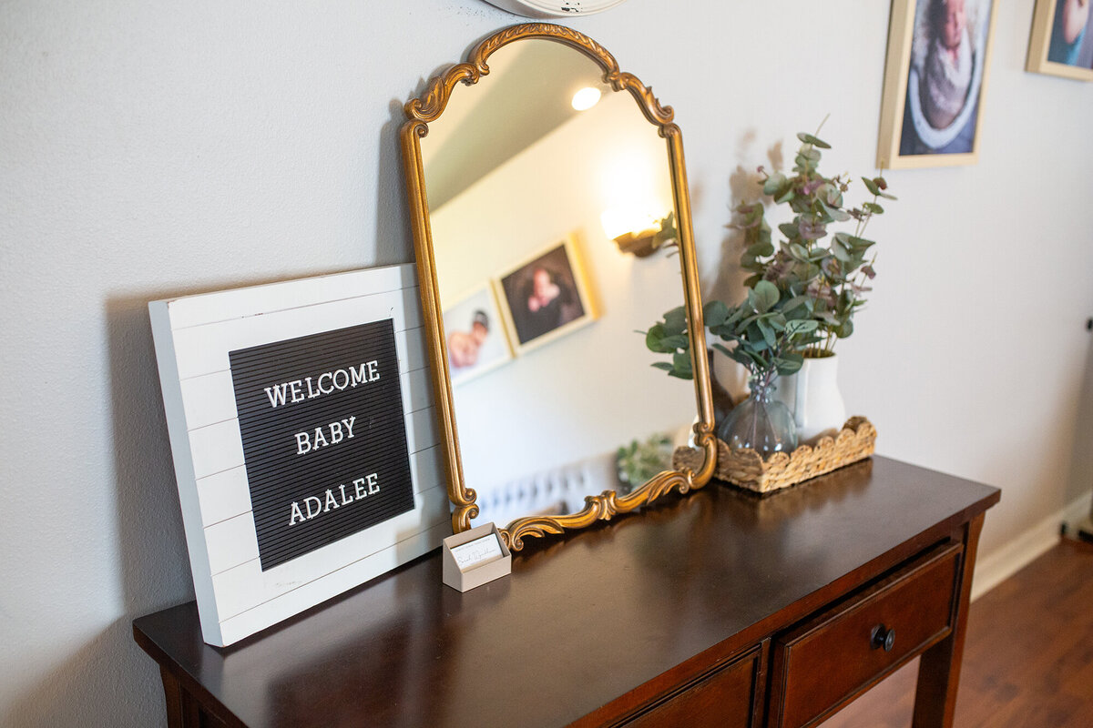 Inside studio tour close-up of welcome sign and mirror. Studio located in Riverview, FL 
