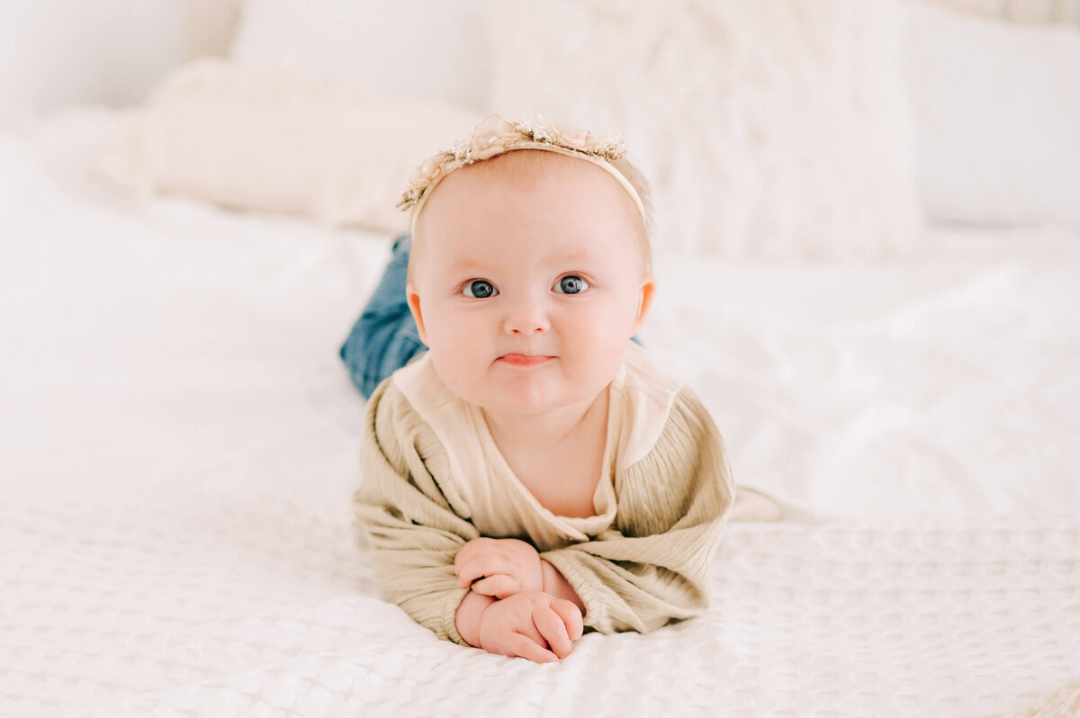 little girl pursing lips  captured by Springfield MO baby photographer Jessica Kennedy of The XO Photography