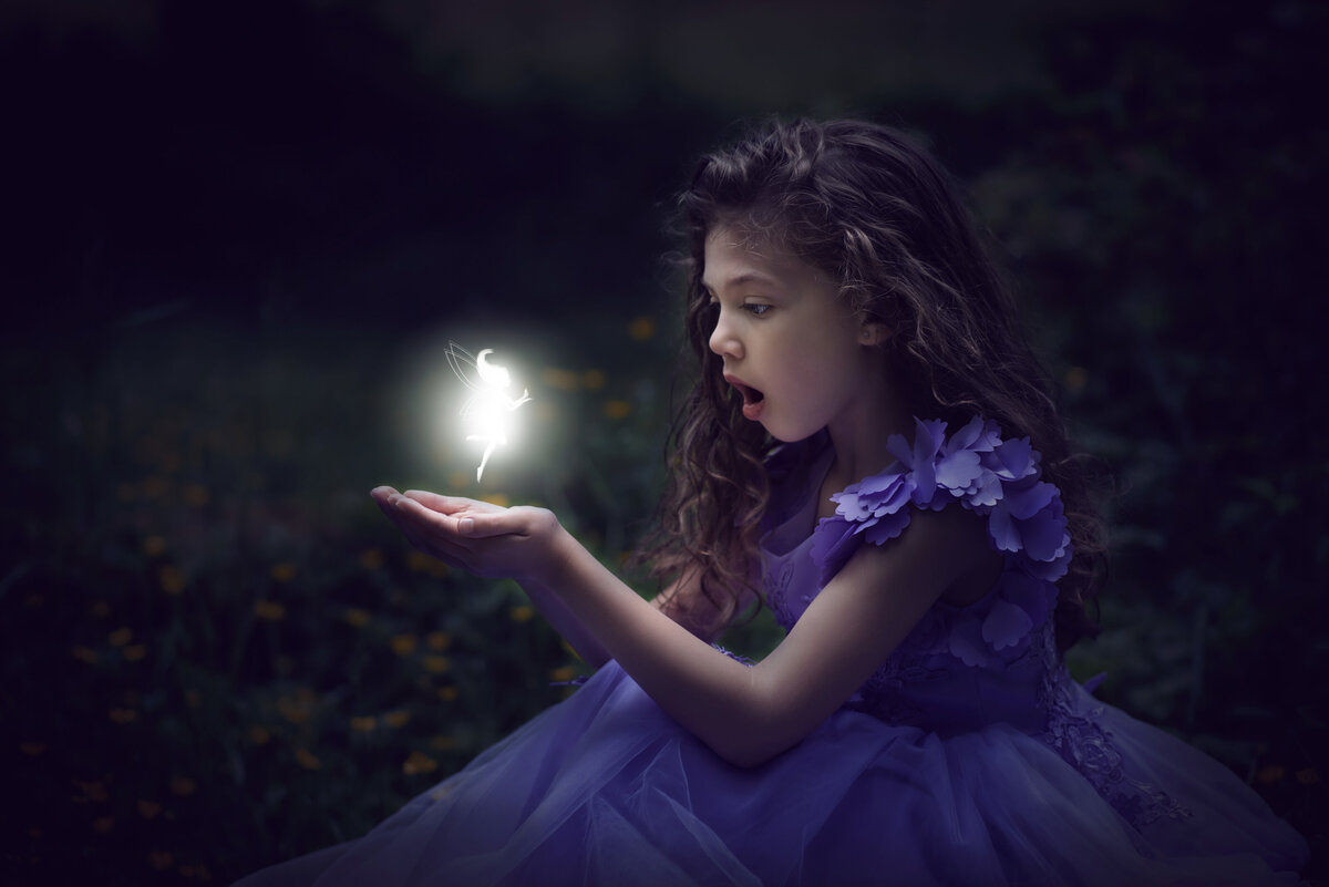 Girl holding a fairy